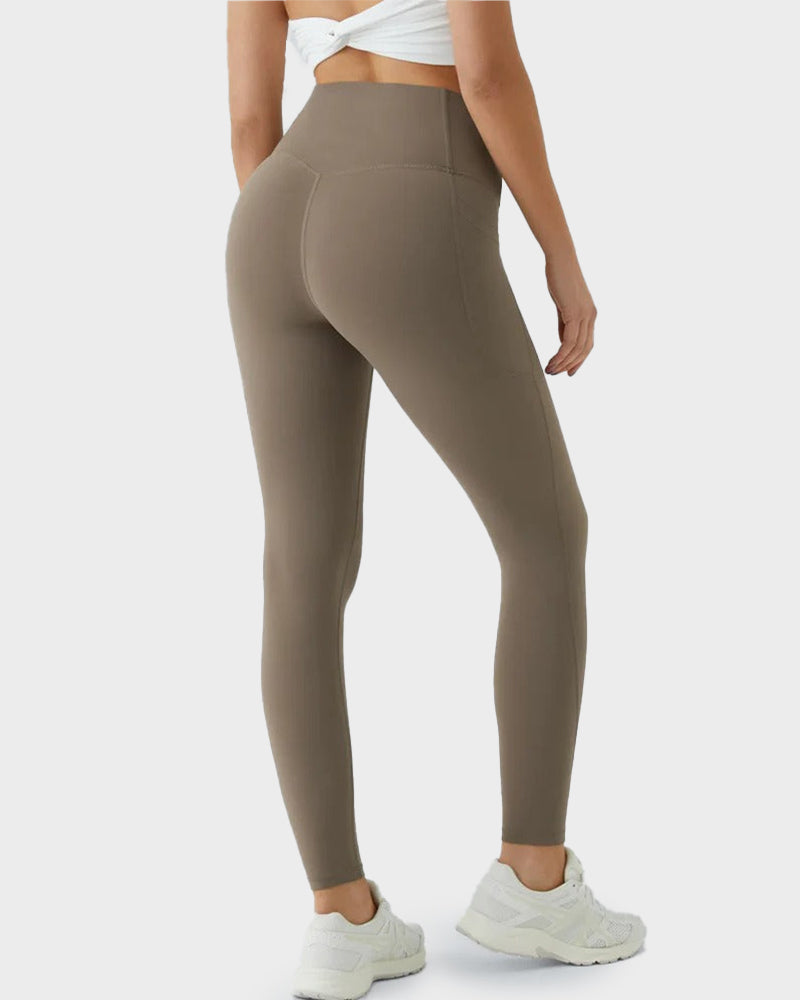 Sport-Leggings mit formendem Push-Up-Effekt und Taschen