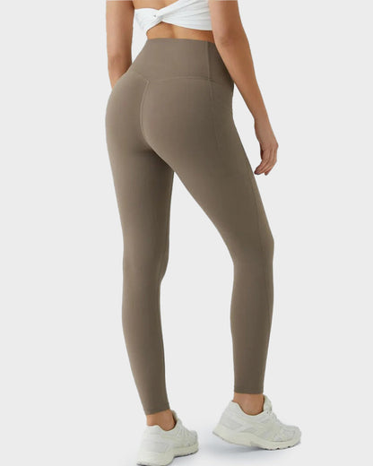 Sport-Leggings mit formendem Push-Up-Effekt und Taschen