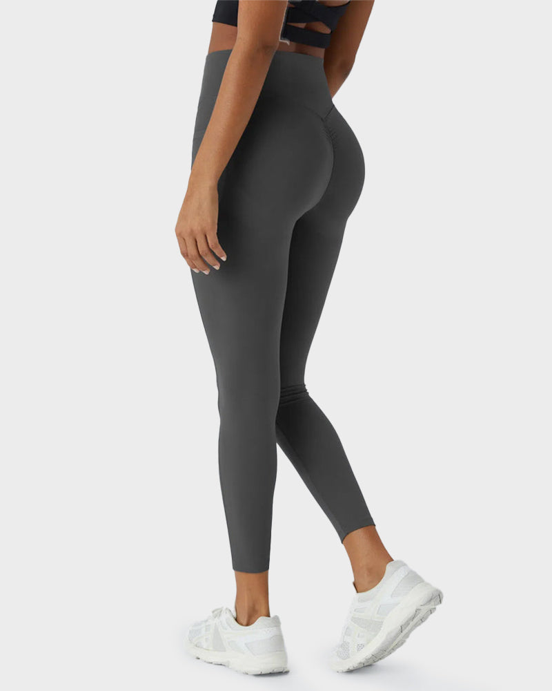 Sport-Leggings mit formendem Push-Up-Effekt und Taschen